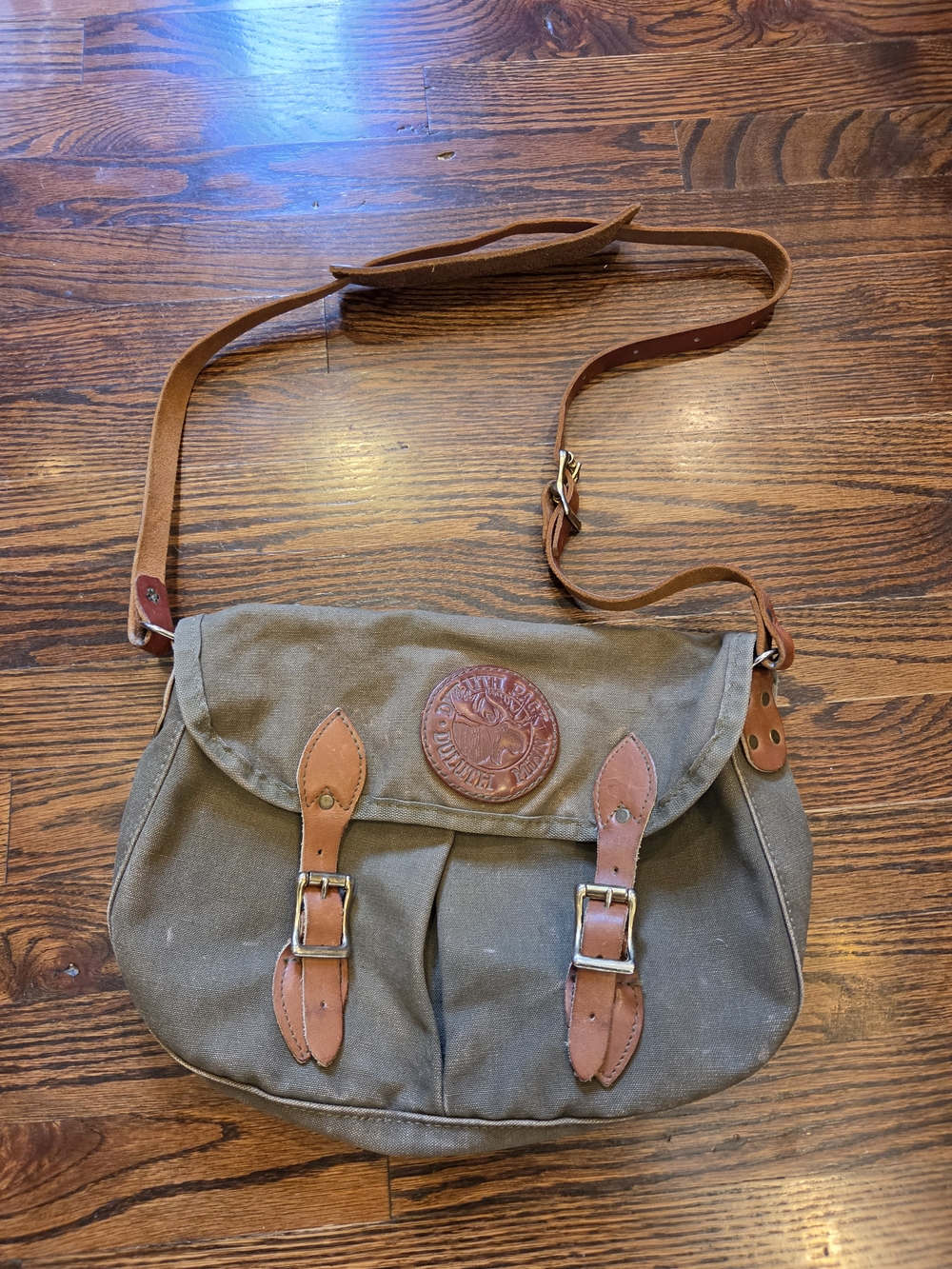 Duluth Pack Medium Double Shell Bag in olive green canvas with premium leather